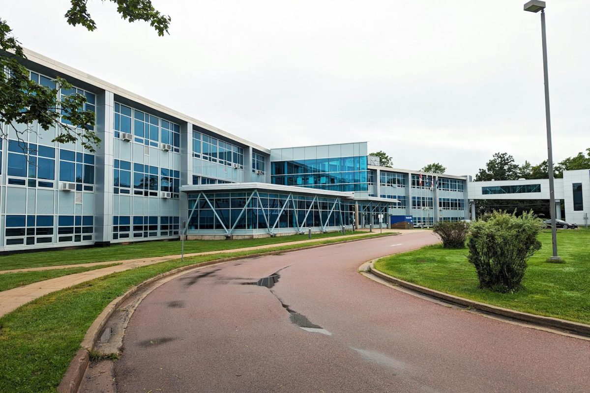 Contemporary university building in Truro, Nova Scotia with sleek glass architecture.