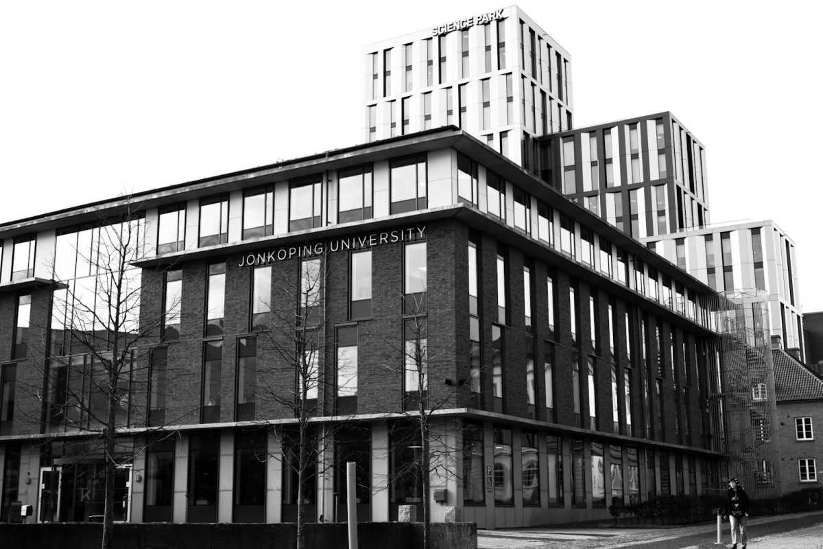 Striking black and white image of Jönköping University's modern architecture in Sweden.