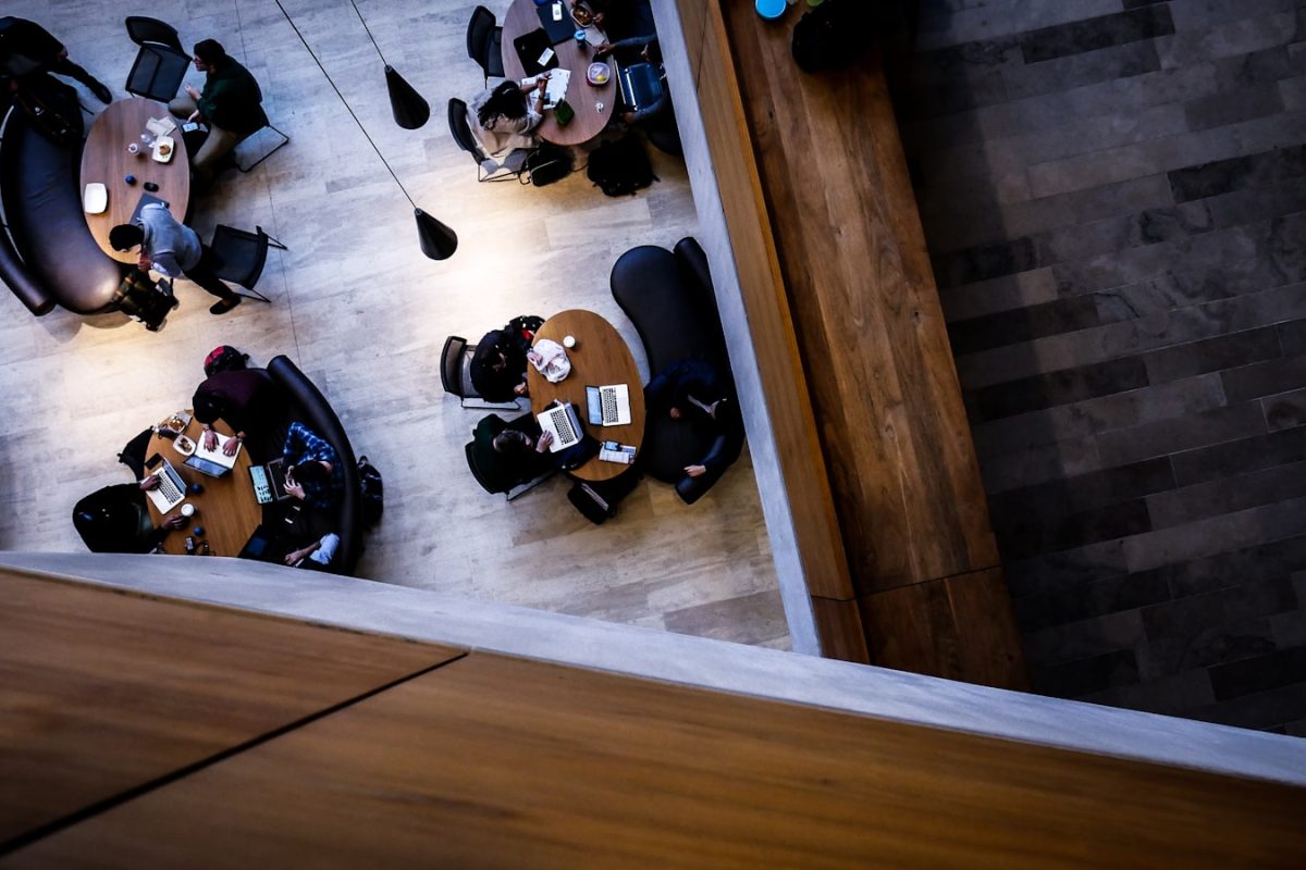 aerial photography of people sitting on chair