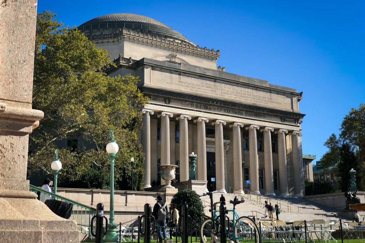 a bike is parked in front of a building