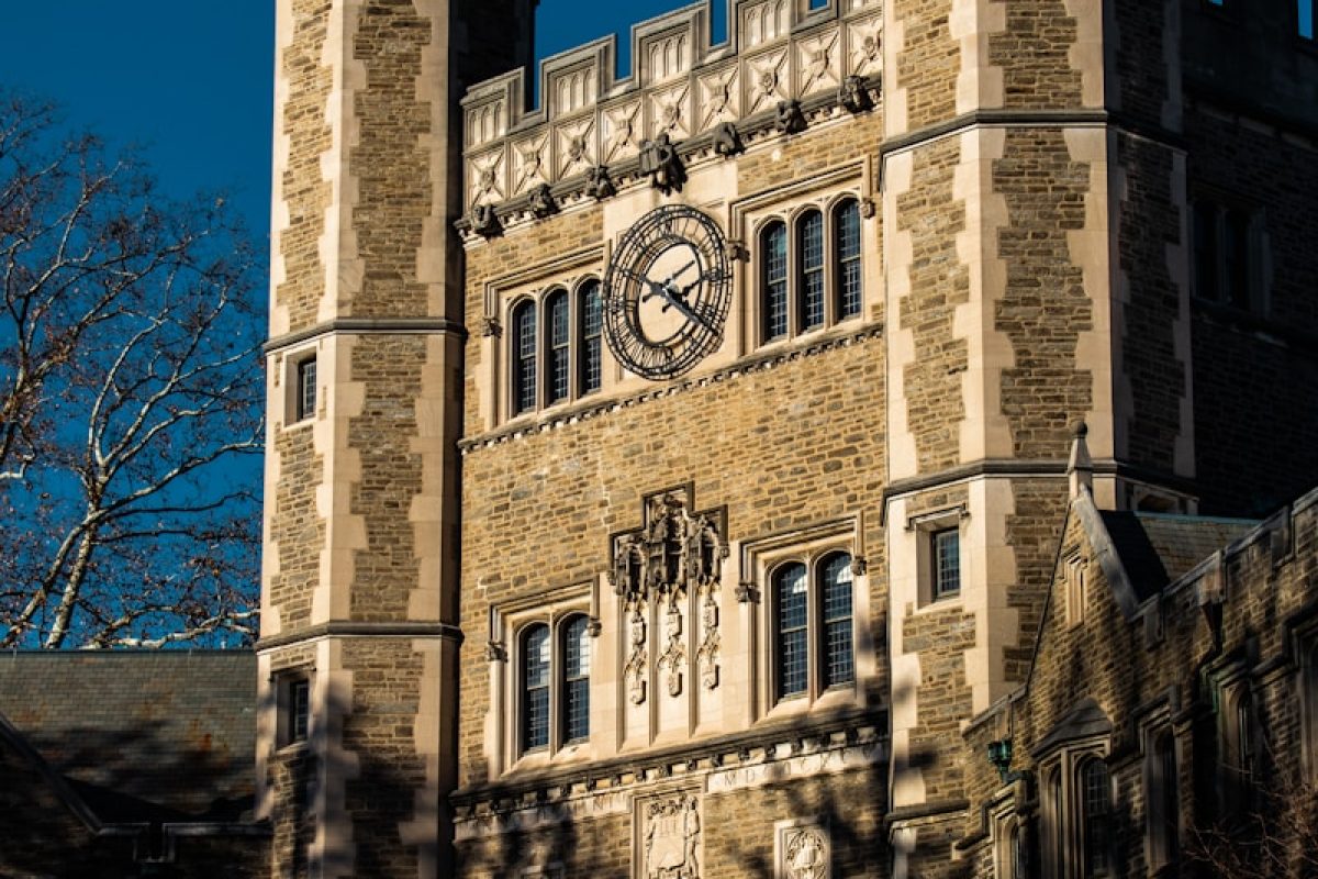 a large building with a clock on the front of it